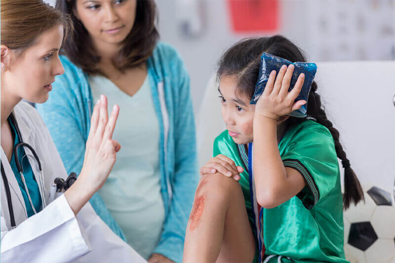 girl with a knee and and injury at the urgent care